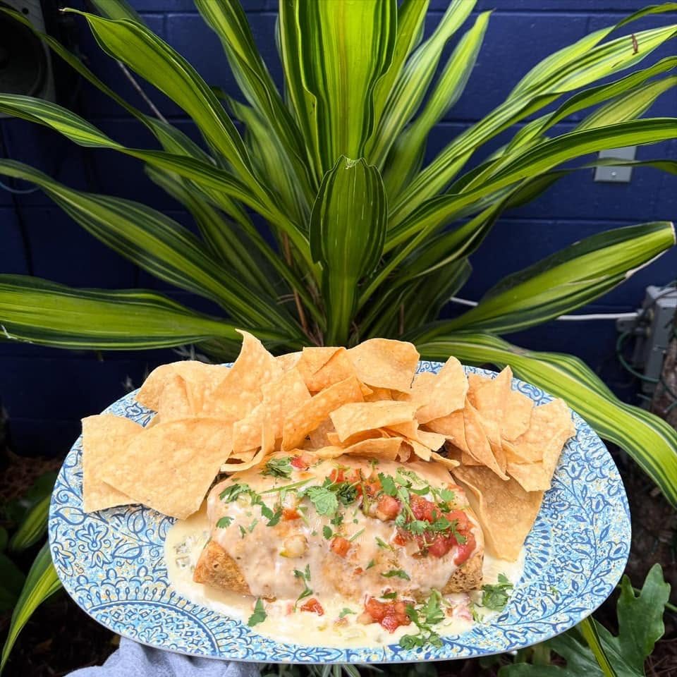 A plate of chips and queso